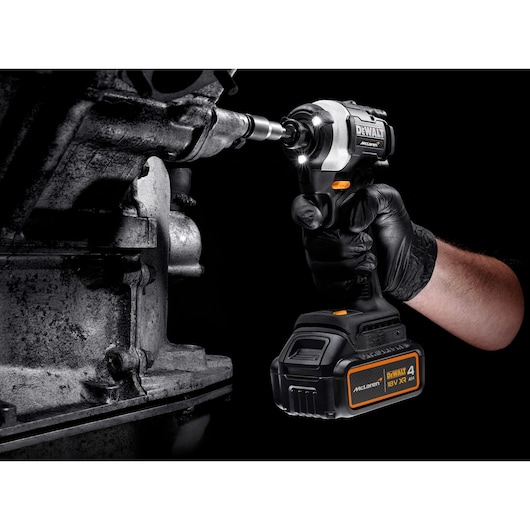 DEWALT/McLaren Impact Driver drilling with LED light on