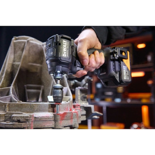 DEWALT x McLaren F1 Team 18V XR Special Edition Impact Driver with 4Ah battery in application