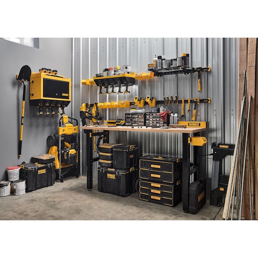 DEWALT Work Bench Featuring Portable Storage, Power Tools, Hand Tools, Batteries and Accessories.