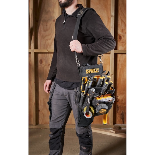 soft tool organizer and model with the bag on the right shoulder 